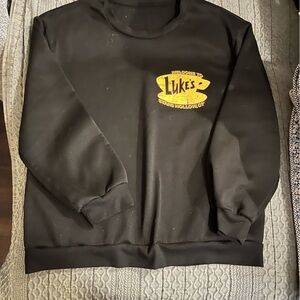Black Crewneck Sweatshirt with Yellow 'Luke's' Logo